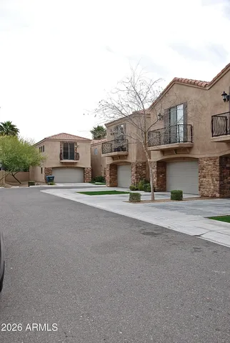 a view of a street with houses