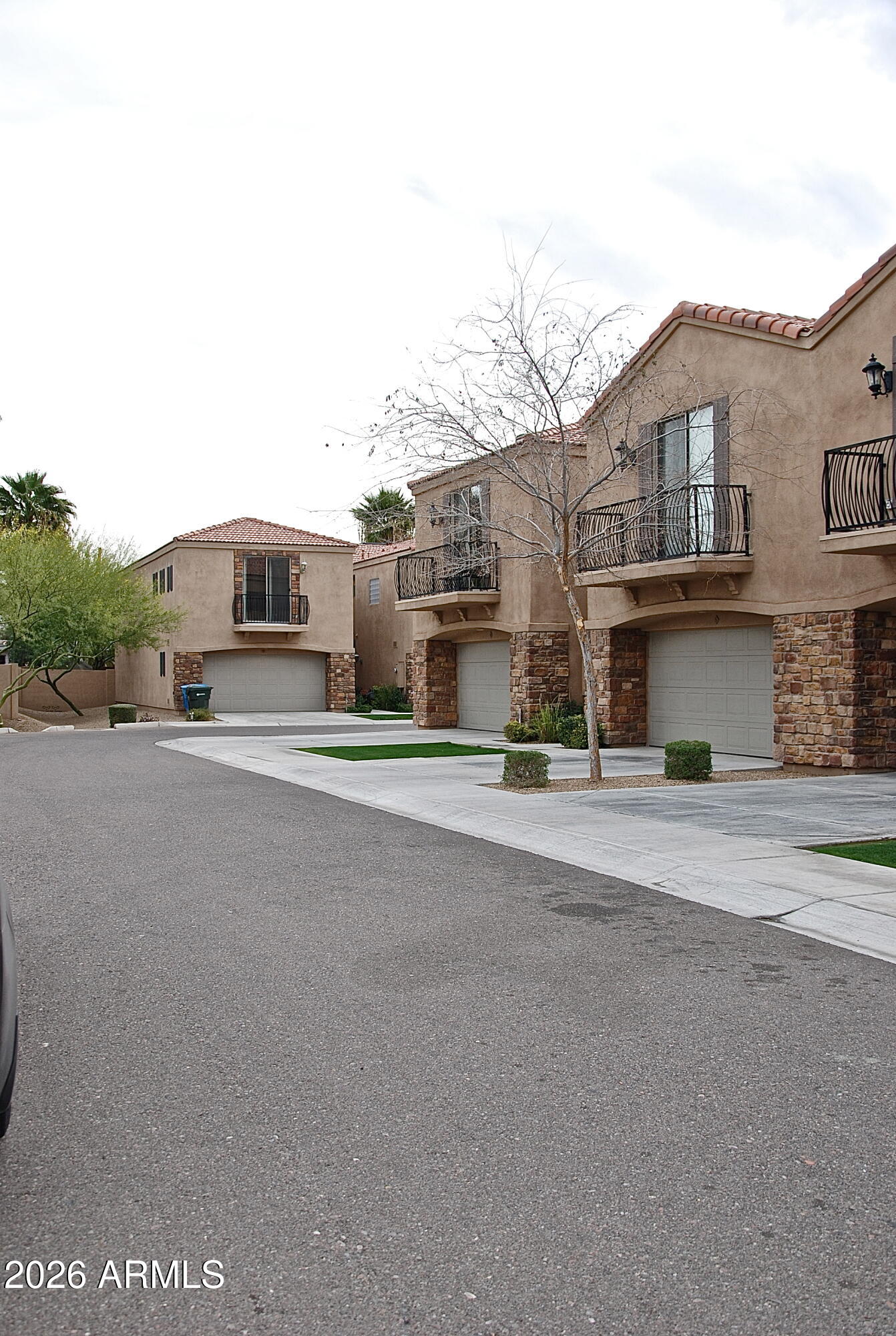 a view of a street with houses