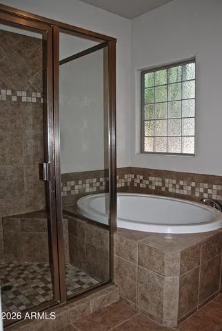 a bathroom with a sink and a bathtub