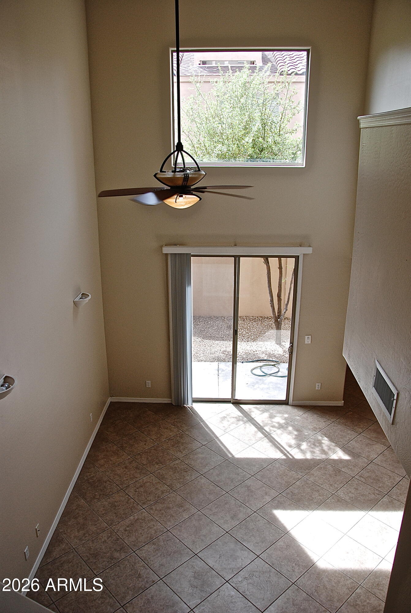 2611 North 48th Street, Unit 4 Phoenix, AZ 85008 - Photo 22 of 23 a view of an empty room with a window