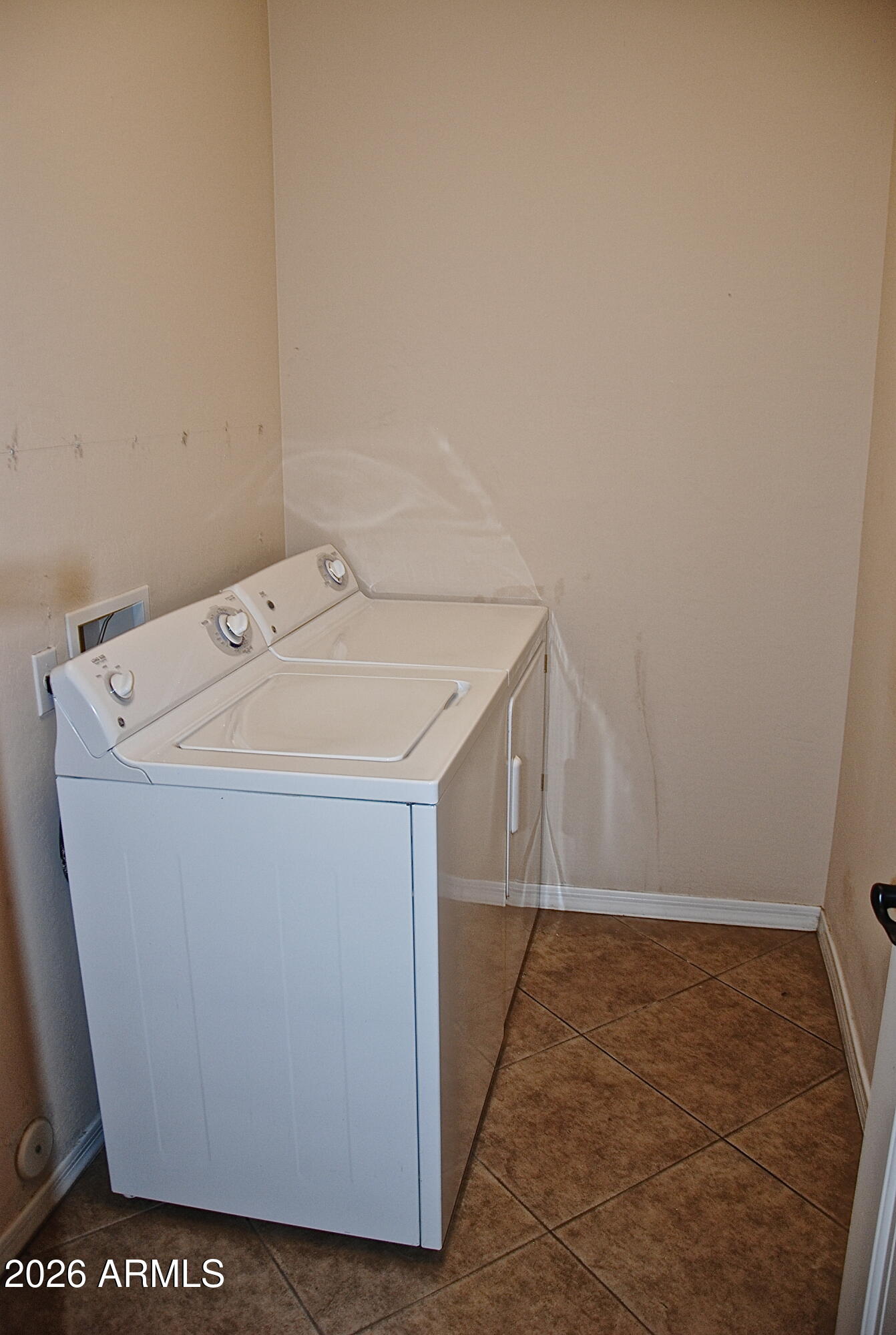 2611 North 48th Street, Unit 4 Phoenix, AZ 85008 - Photo 9 of 23 a utility room with dryer and washer