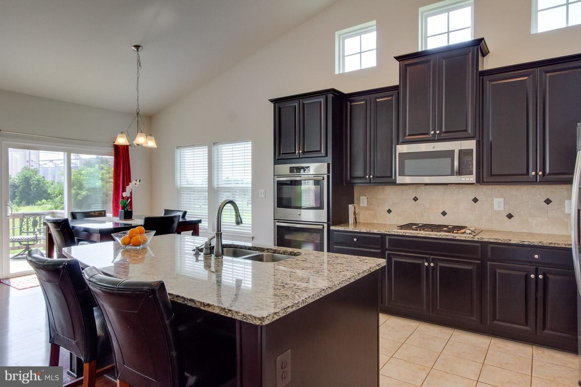 413 Standpipe Road Culpeper, VA 22701 - Photo 6 of 30 Kitchen Accent Windows over Cabninets