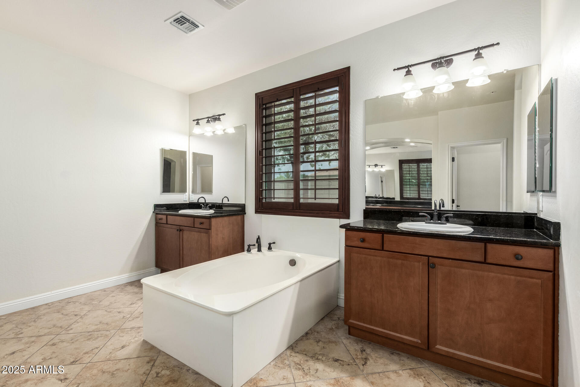 19263 East Estrella Road Queen Creek, AZ 85142 - Photo 22 of 53 a kitchen with a sink a stove and cabinets