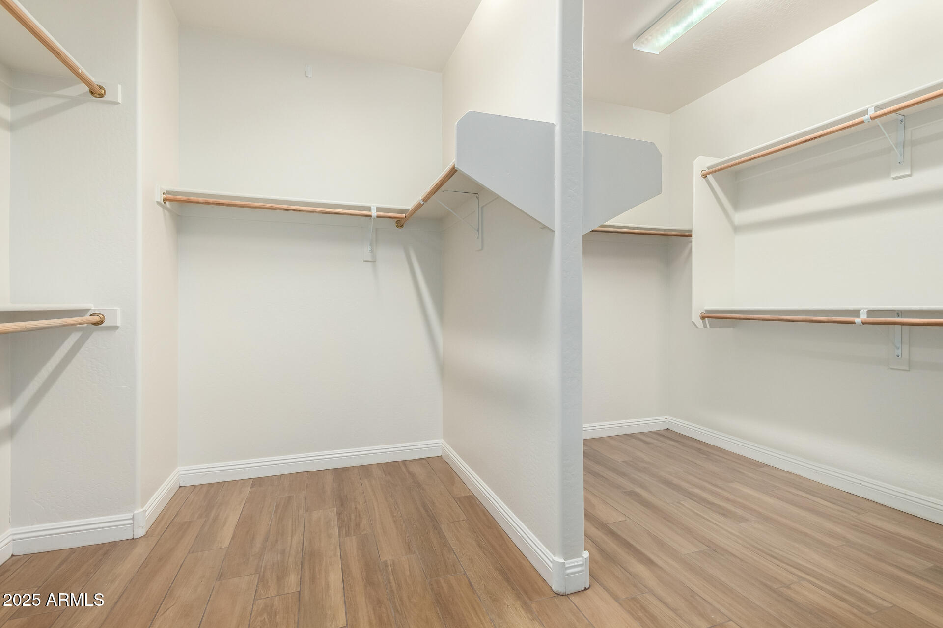 19263 East Estrella Road Queen Creek, AZ 85142 - Photo 23 of 53 a view of an empty walk in closet