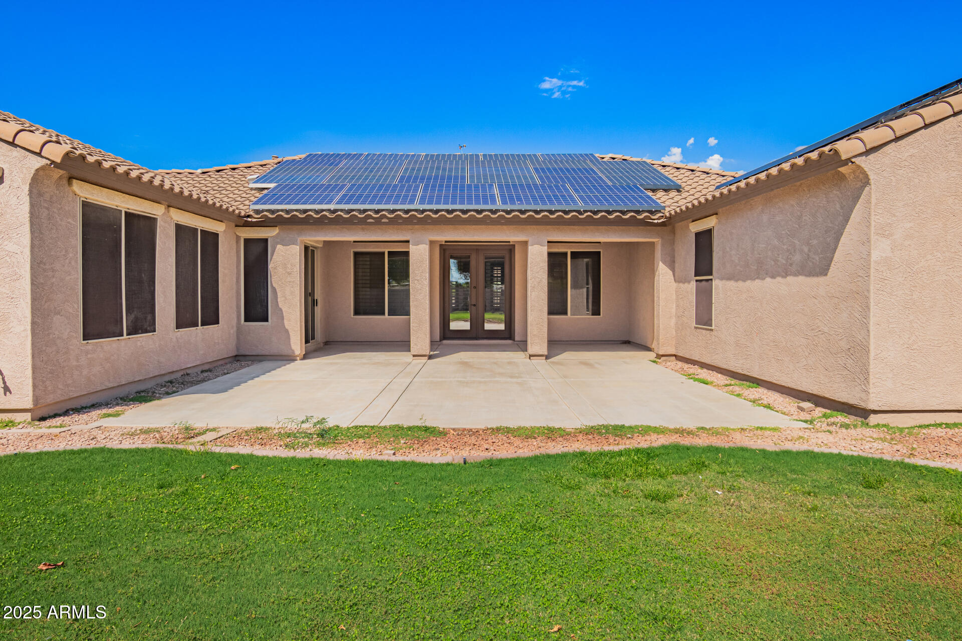 19263 East Estrella Road Queen Creek, AZ 85142 - Photo 46 of 53 a view of a house with a backyard and porch