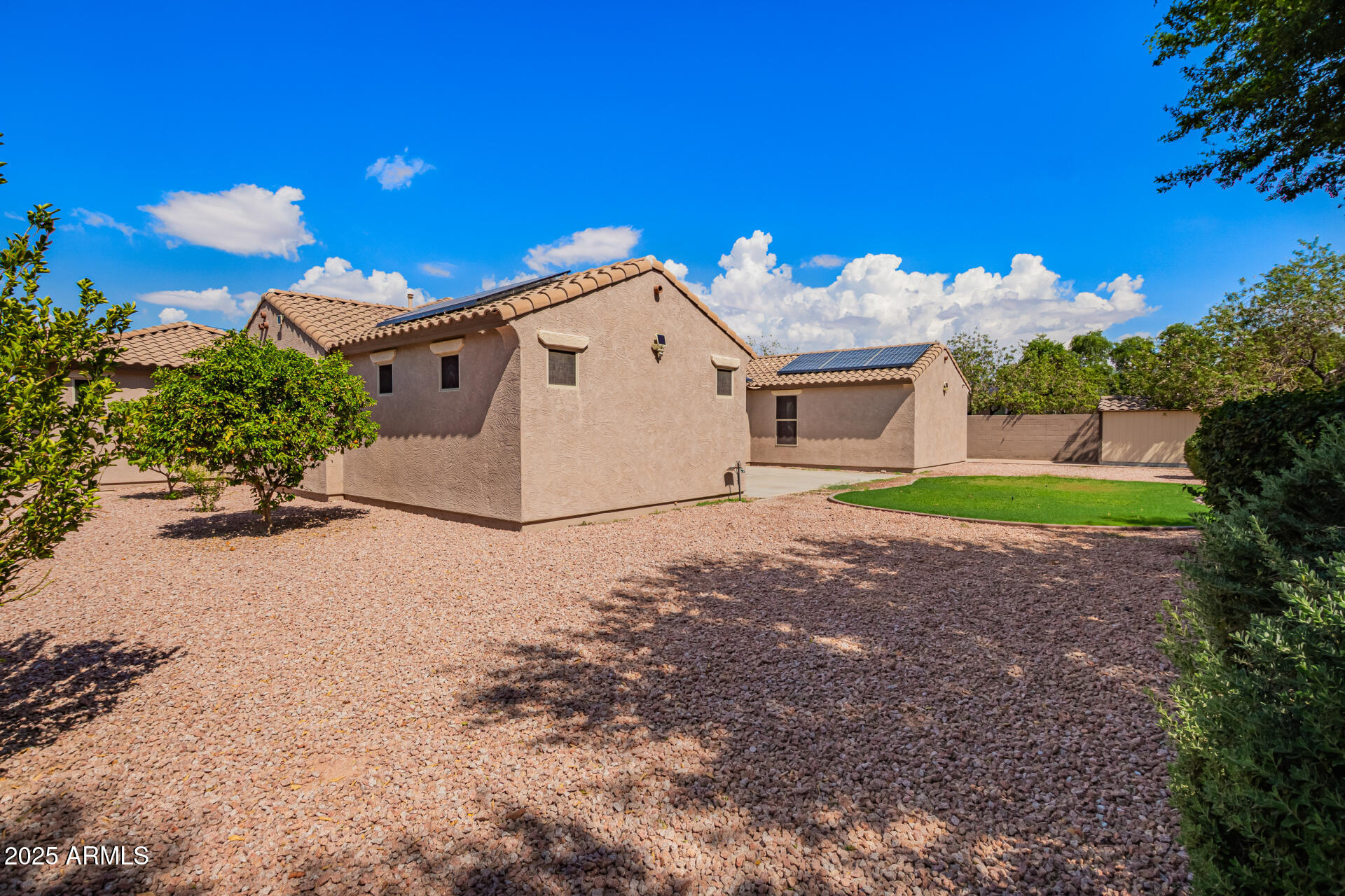 19263 East Estrella Road Queen Creek, AZ 85142 - Photo 49 of 53 a front view of a house with a yard and garage