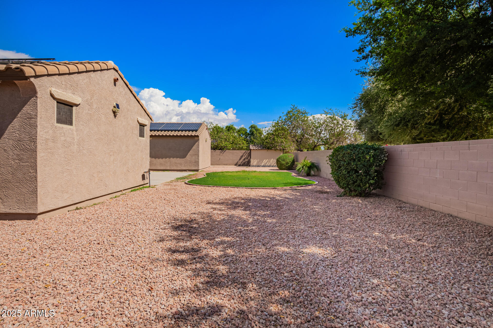 19263 East Estrella Road Queen Creek, AZ 85142 - Photo 50 of 53 a view of a house with a yard