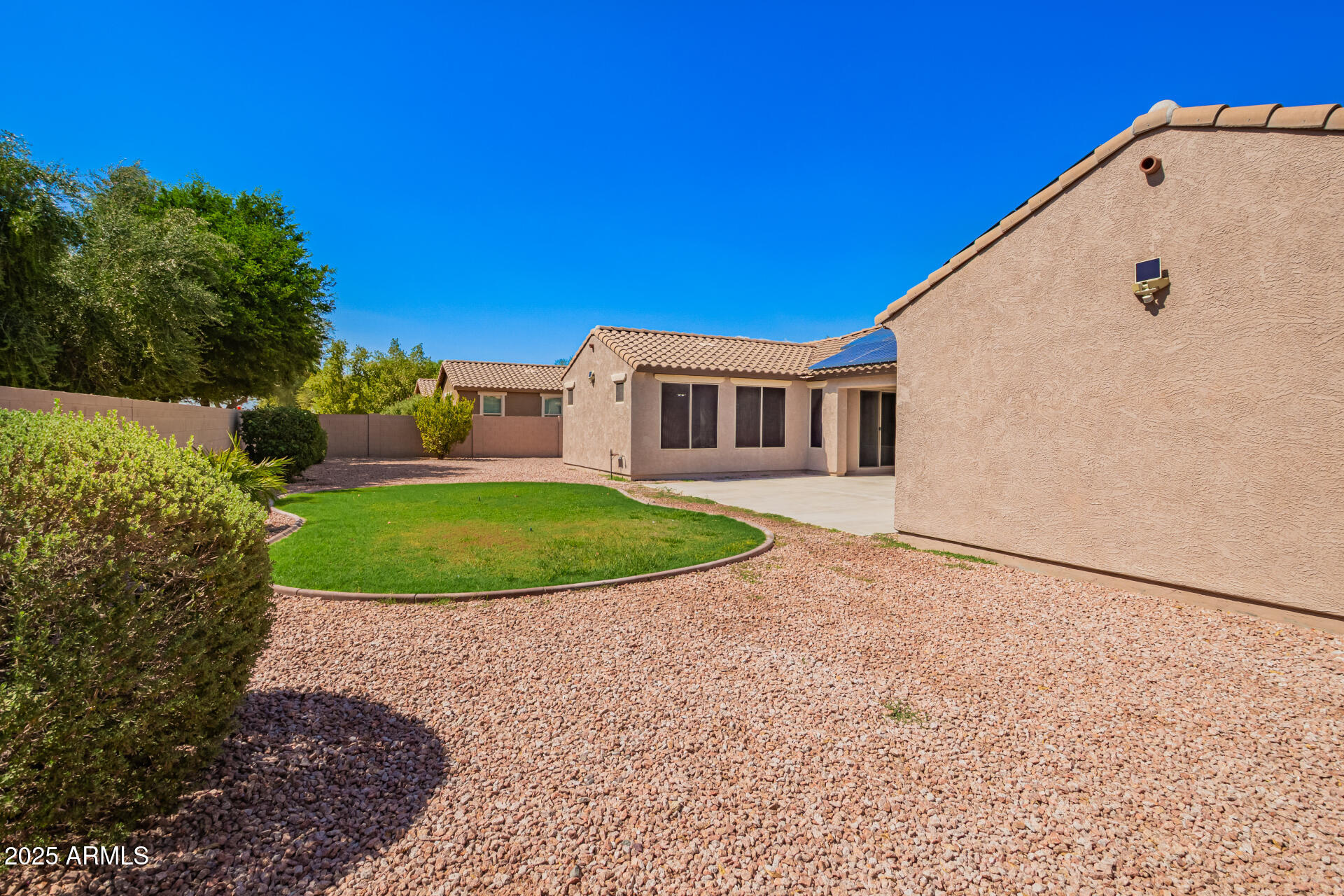 19263 East Estrella Road Queen Creek, AZ 85142 - Photo 53 of 53 a view of a house with a backyard