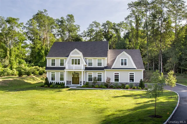 a front view of a house with swimming pool