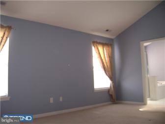 24 Hogan Way Moorestown, NJ 08057 - Photo 9 of 9 an empty room with windows