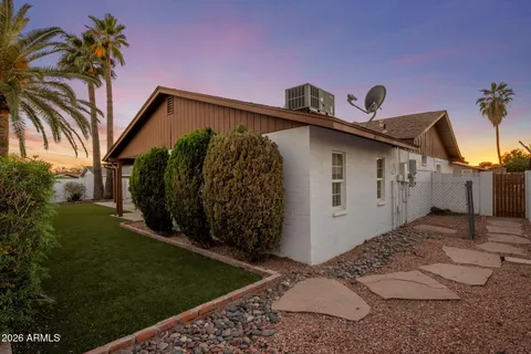 a view of swimming pool with yard