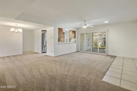 a kitchen with stainless steel appliances granite countertop a sink and a stove