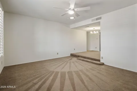 a view of a livingroom with wooden floor