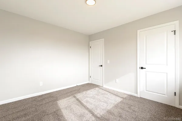 an empty room with a natural light