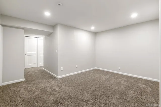 an empty room with an entryway