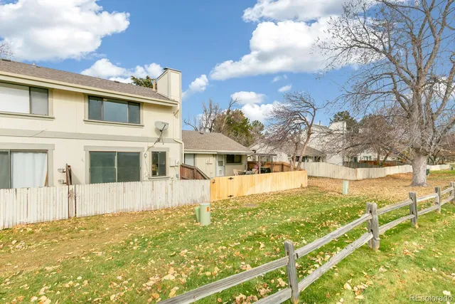 a house with trees in the background