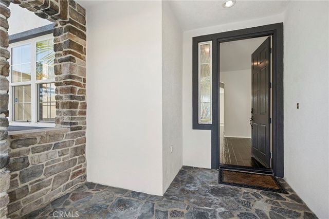 a view of a bathroom with a glass door