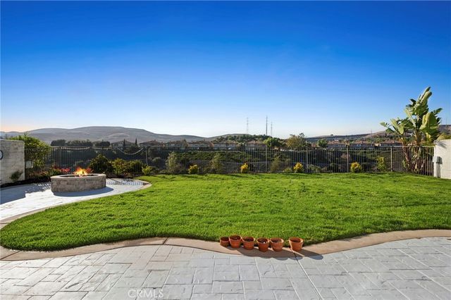 a view of a garden with houses
