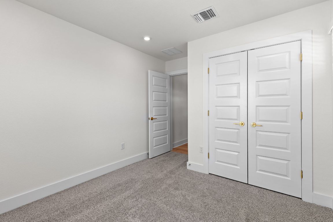 6312 Stockman Drive, Unit 6 Austin, TX 78747 - Photo 12 of 35 an empty room with closet area