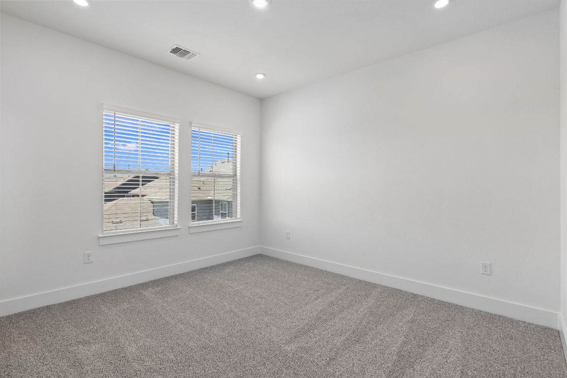 6312 Stockman Drive, Unit 6 Austin, TX 78747 - Photo 20 of 35 an empty room with a window