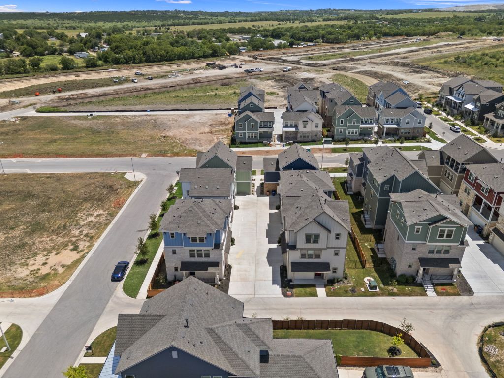 6312 Stockman Drive, Unit 6 Austin, TX 78747 - Photo 32 of 35 an aerial view of residential houses with outdoor space