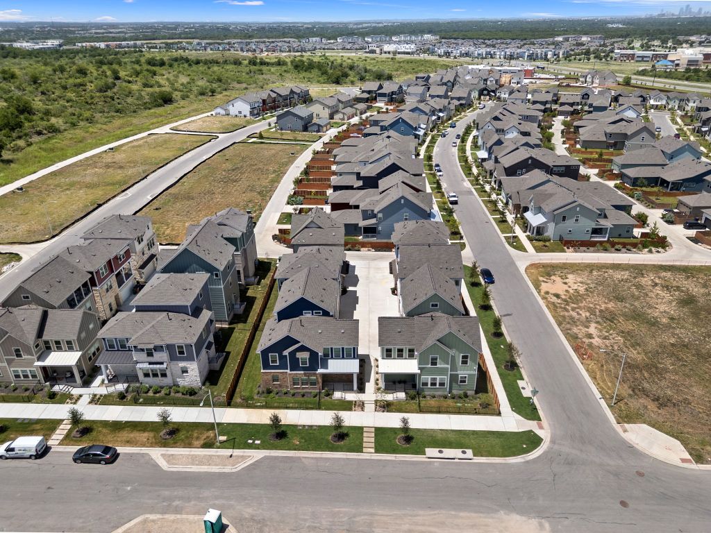 6312 Stockman Drive, Unit 6 Austin, TX 78747 - Photo 34 of 35 an aerial view of residential houses with outdoor space
