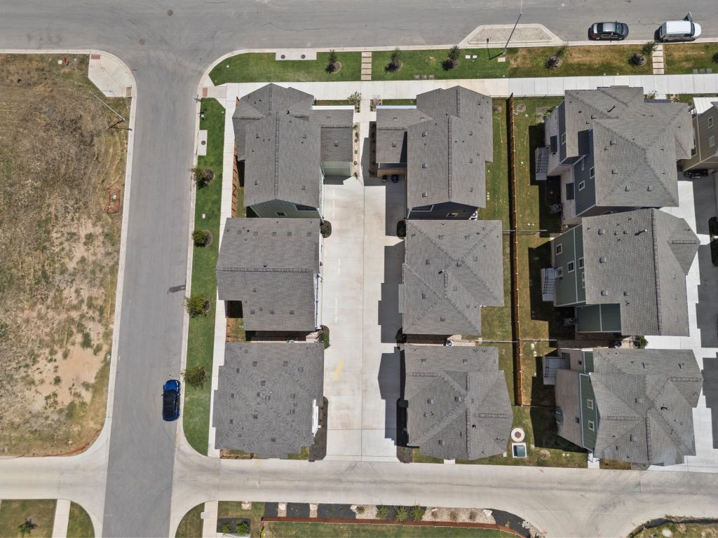 6312 Stockman Drive, Unit 6 Austin, TX 78747 - Photo 35 of 35 an aerial view of residential houses with outdoor space