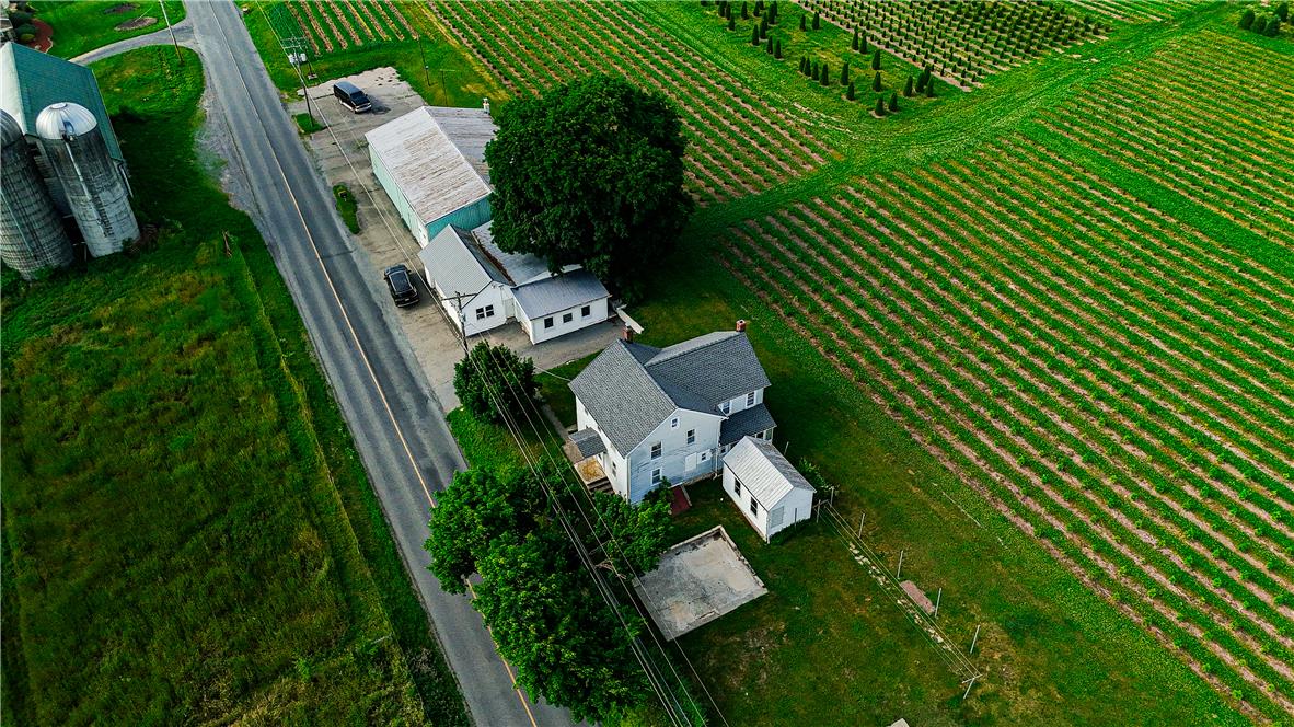 868 Catawissa Road Tamaqua, PA 18252 - Photo 1 of 67 An aerial perspective showcases this property's vast agricultural surroundings and charming residential structures.