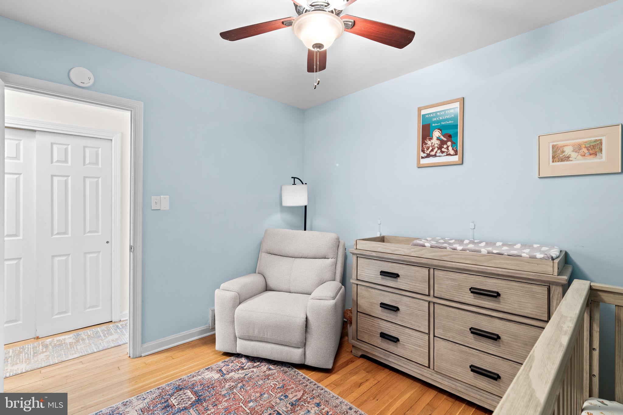 10310 Brunswick Avenue Silver Spring, MD 20902 - Photo 19 of 43 Serene nursery with soft blue hues.