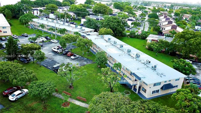 an aerial view of a house with a garden