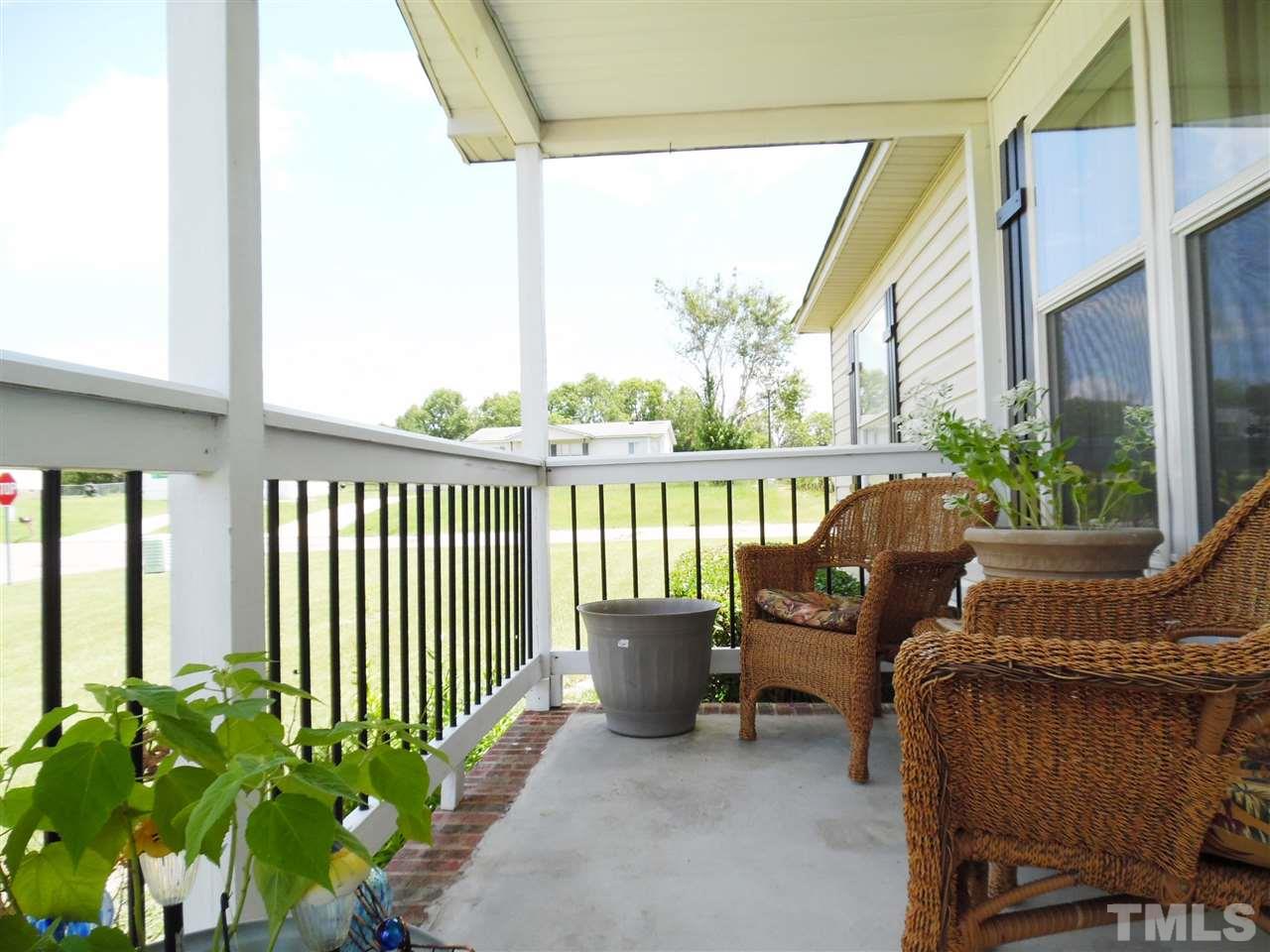 15 Rhode Island Way Cameron, NC 28326 - Photo 4 of 17 a balcony view with a seating space