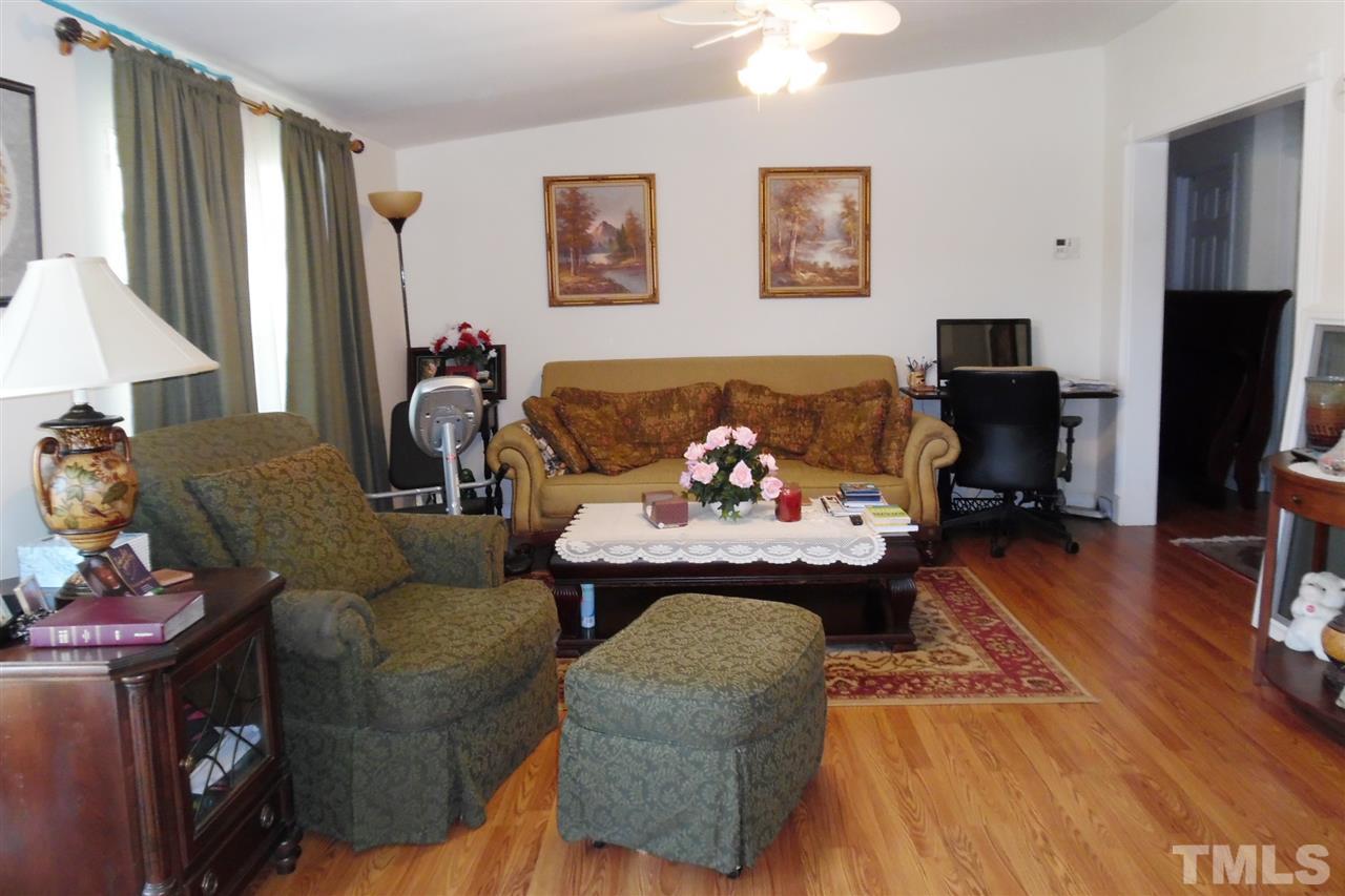 15 Rhode Island Way Cameron, NC 28326 - Photo 5 of 17 a living room with furniture and wooden floor