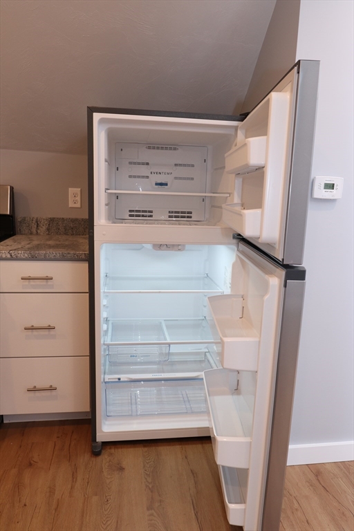 73 Everett Street, Unit 3 Middleboro, MA 02346 - Photo 17 of 17 a view of walk in closet with empty racks