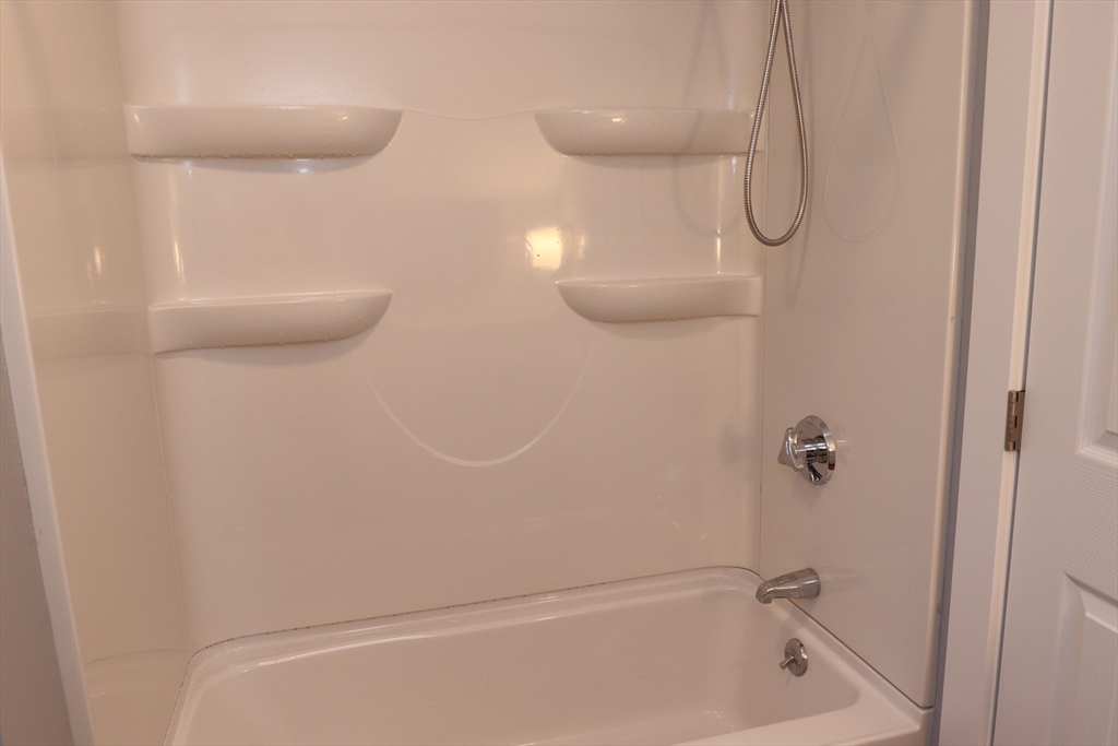 73 Everett Street, Unit 3 Middleboro, MA 02346 - Photo 5 of 17 a bathroom with a shower