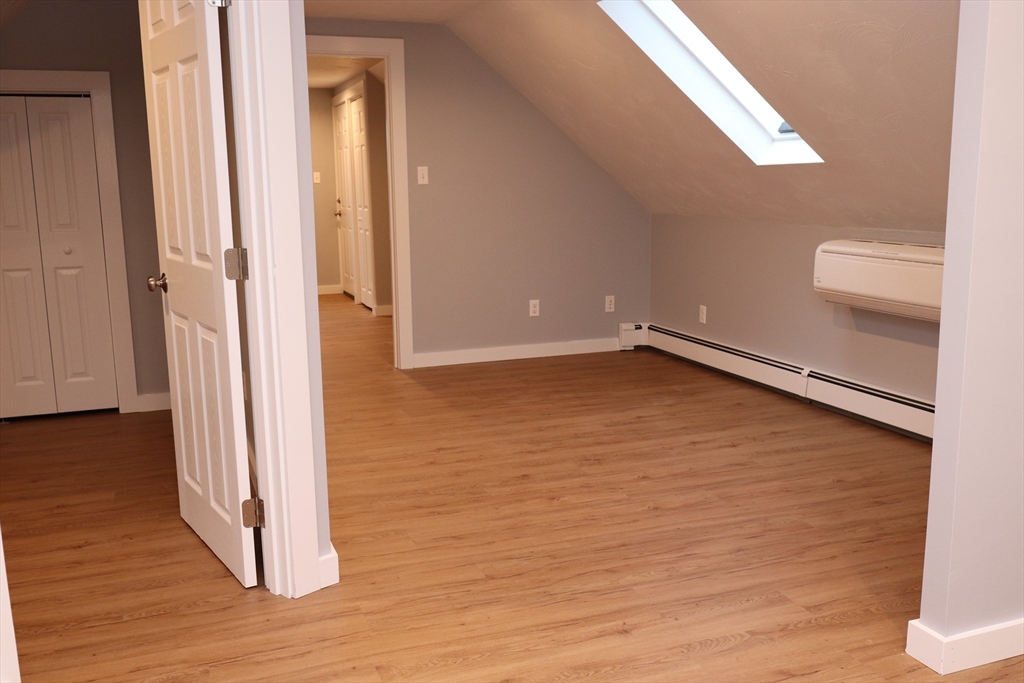 73 Everett Street, Unit 3 Middleboro, MA 02346 - Photo 10 of 17 a view of a room with wooden floor