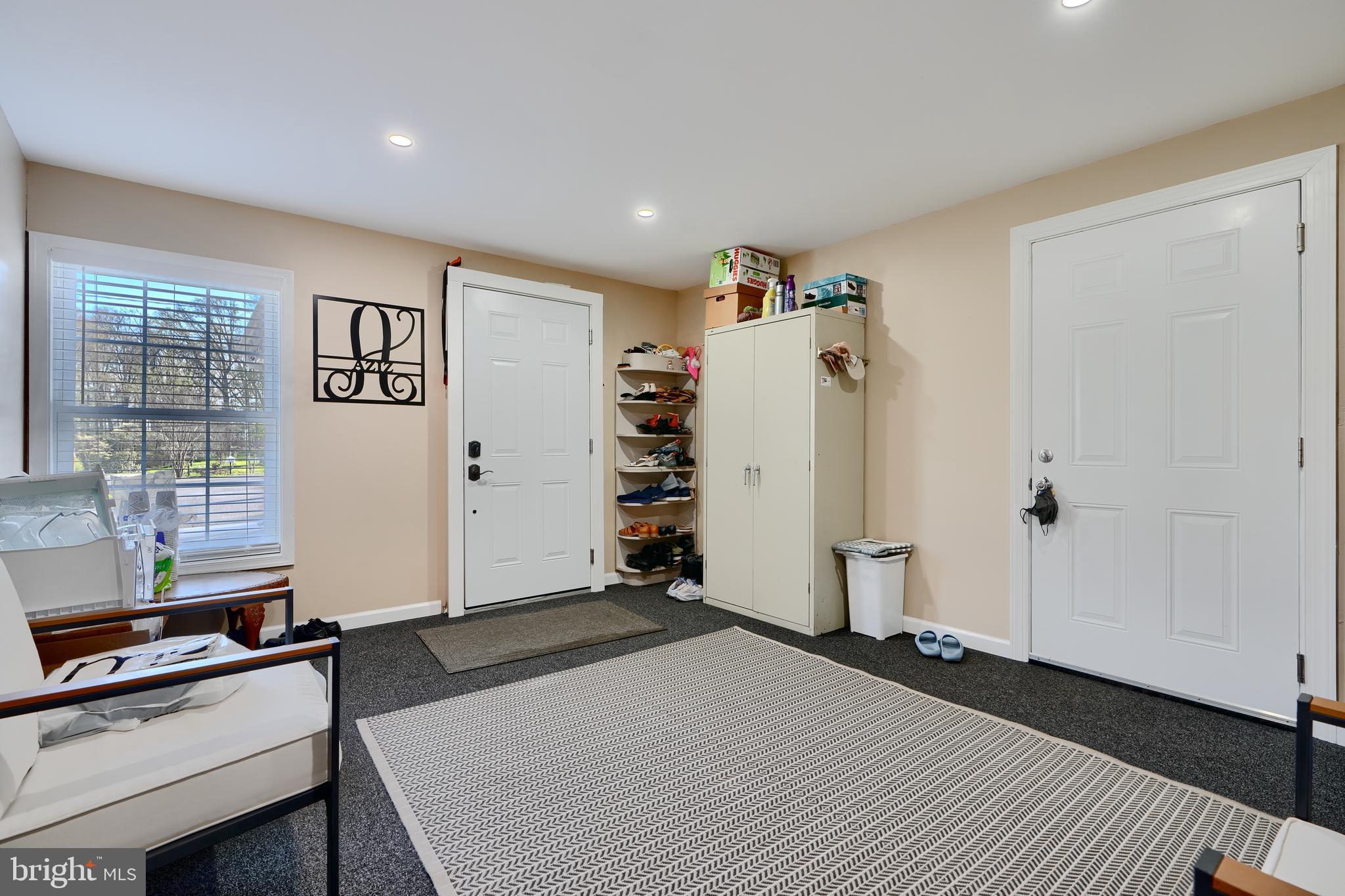 12330 Scaggsville Road Fulton, MD 20759 - Photo 18 of 40 a view of a livingroom with wooden floor and a window