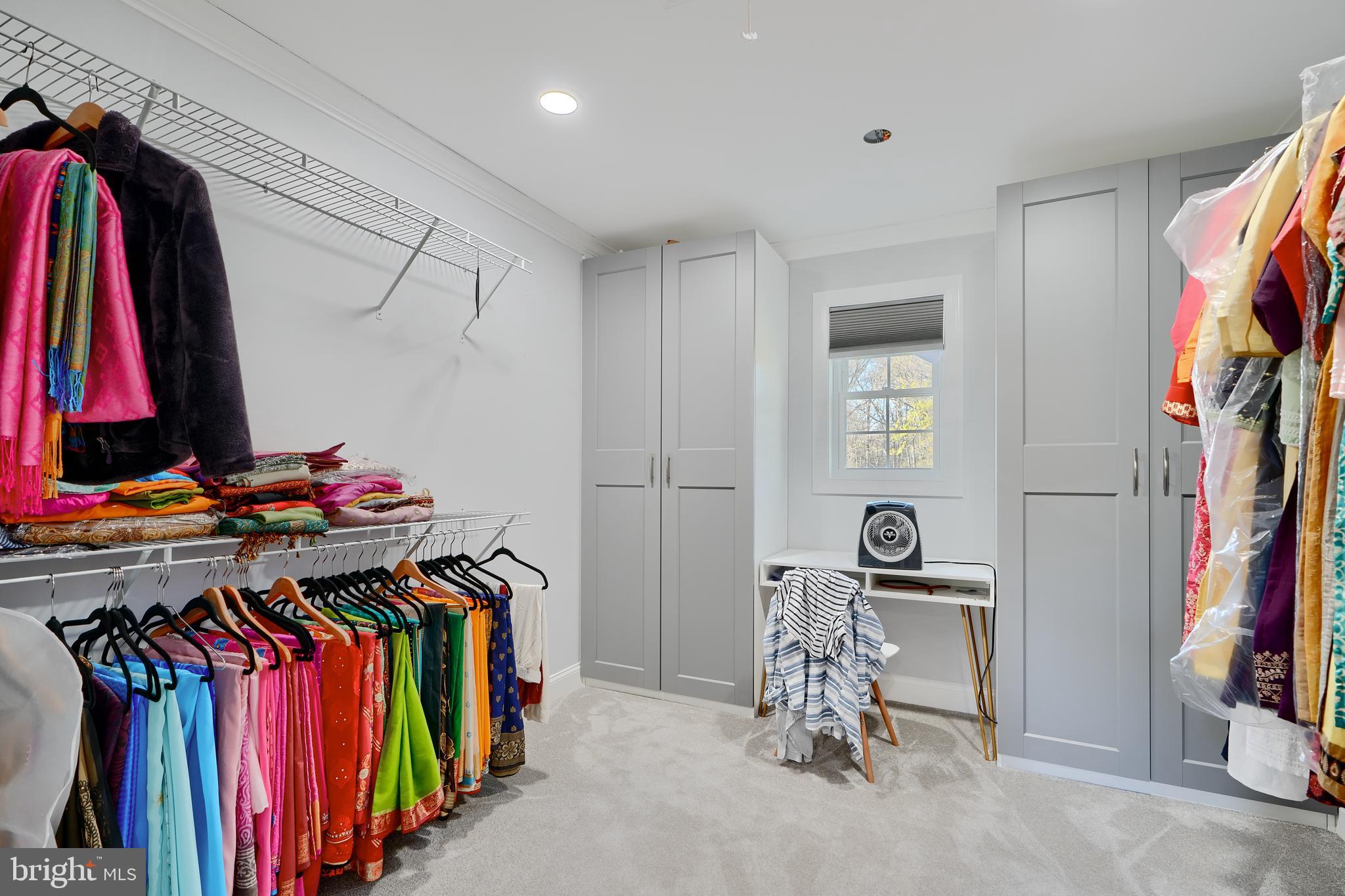 12330 Scaggsville Road Fulton, MD 20759 - Photo 20 of 40 a view of walk in closet with clothes