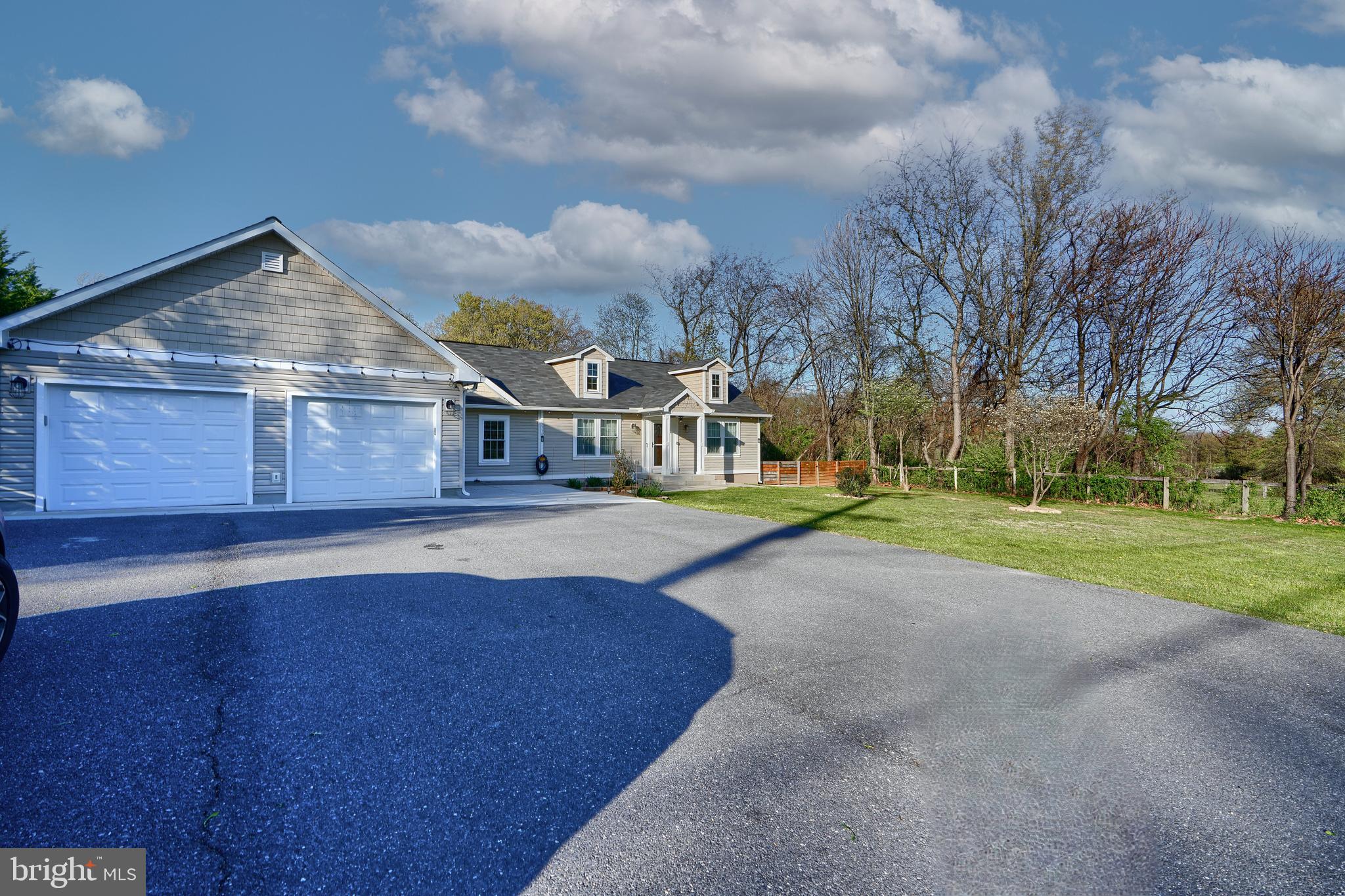 12330 Scaggsville Road Fulton, MD 20759 - Photo 2 of 40 a view of a house with a big yard
