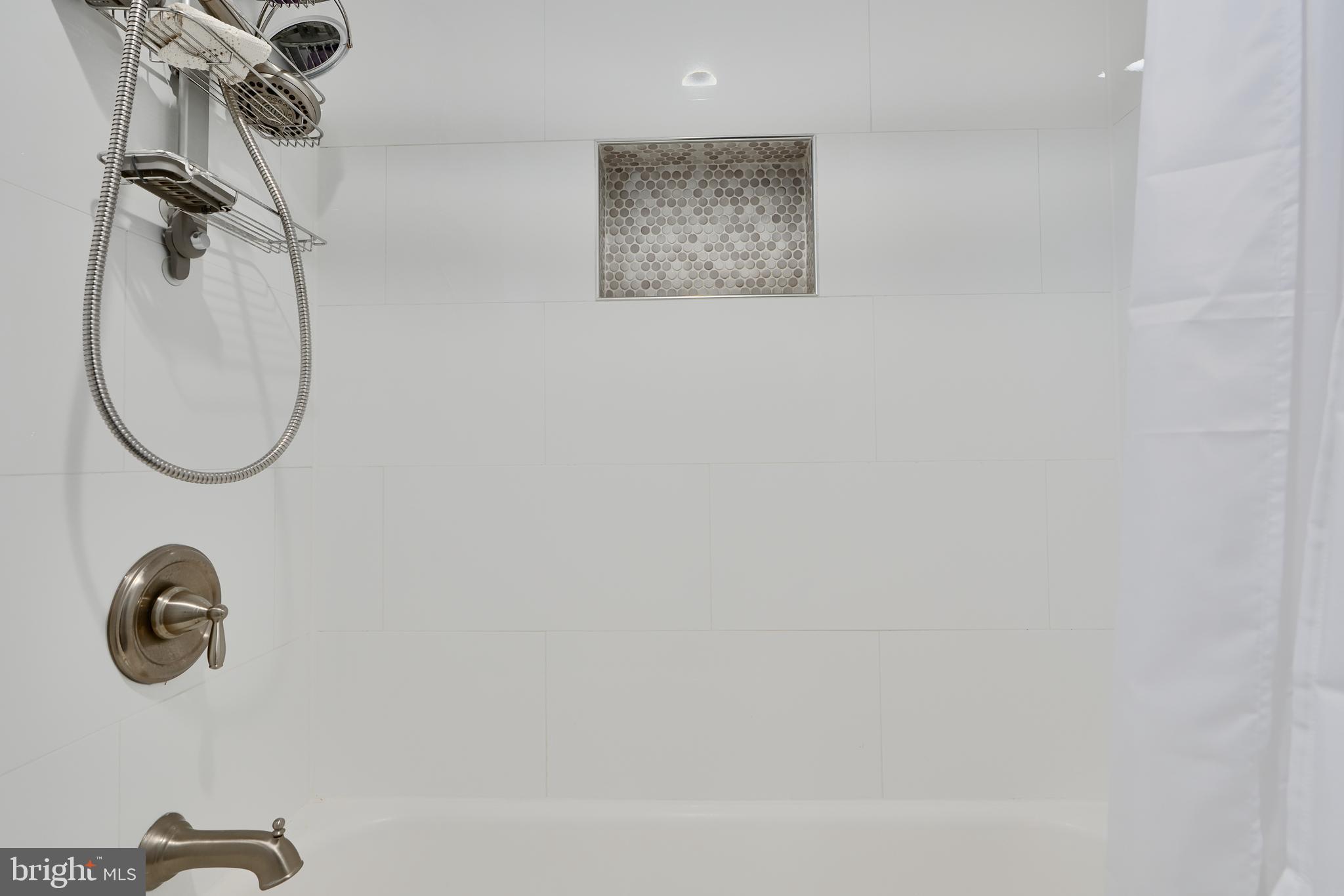 12330 Scaggsville Road Fulton, MD 20759 - Photo 27 of 40 a bathroom with a mirror and a shower