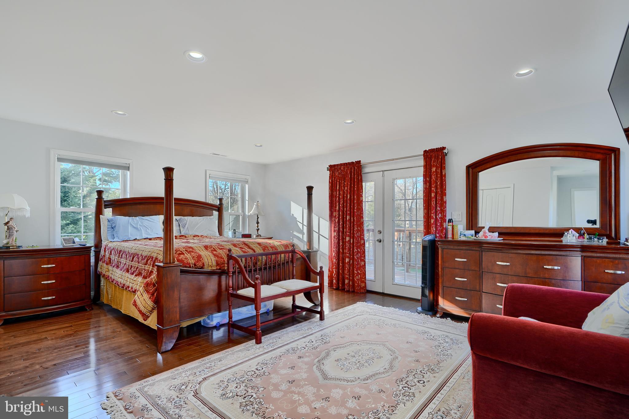 12330 Scaggsville Road Fulton, MD 20759 - Photo 30 of 40 a bedroom with a bed window and couch