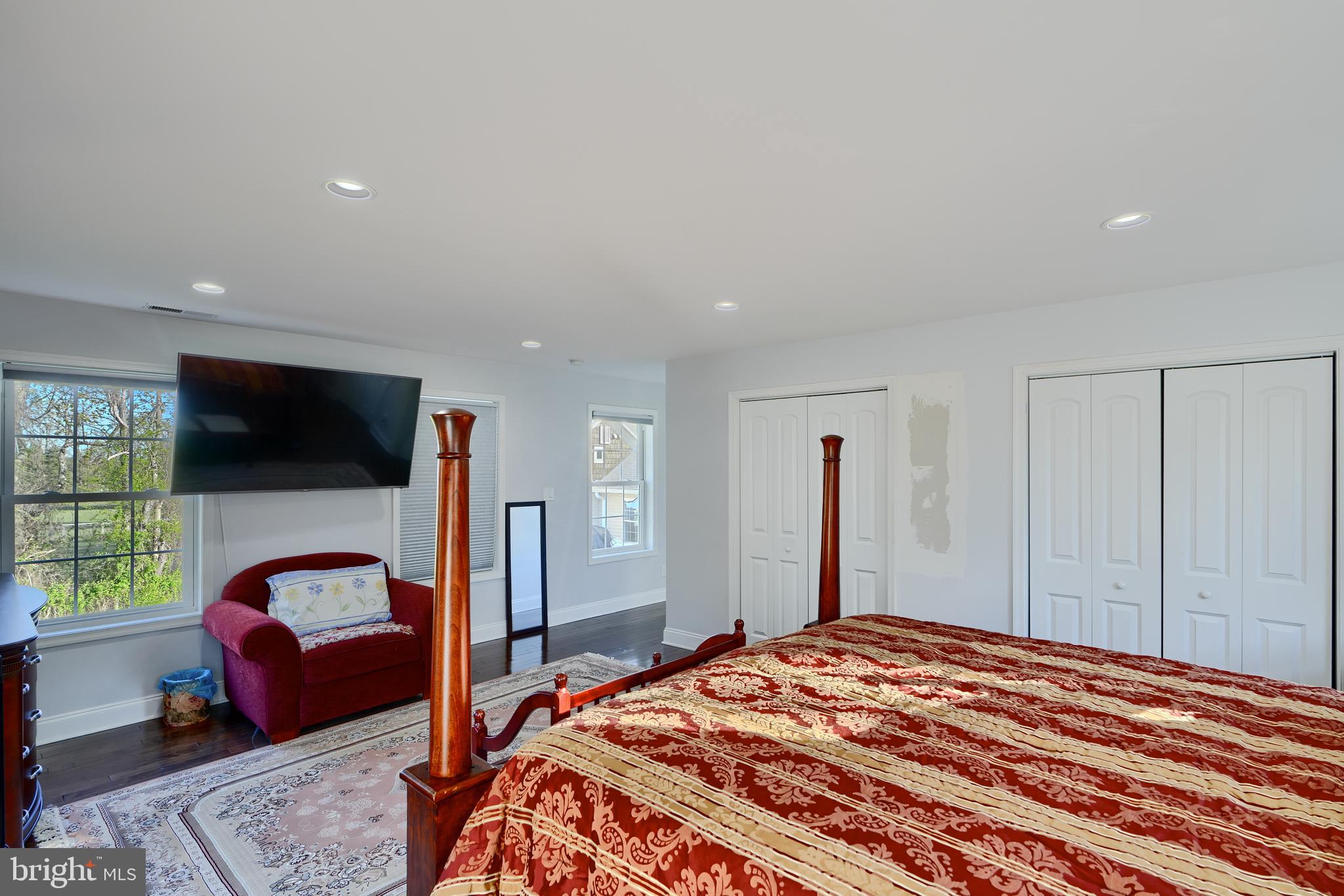 12330 Scaggsville Road Fulton, MD 20759 - Photo 31 of 40 a bedroom with a bed and a flat screen tv