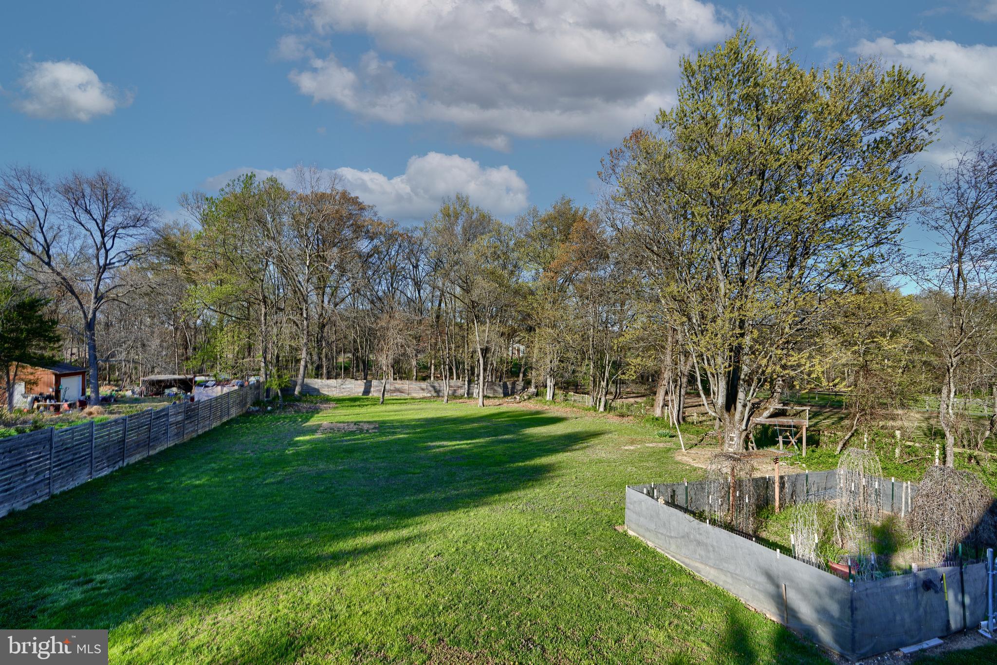 12330 Scaggsville Road Fulton, MD 20759 - Photo 35 of 40 a view of a garden with trees