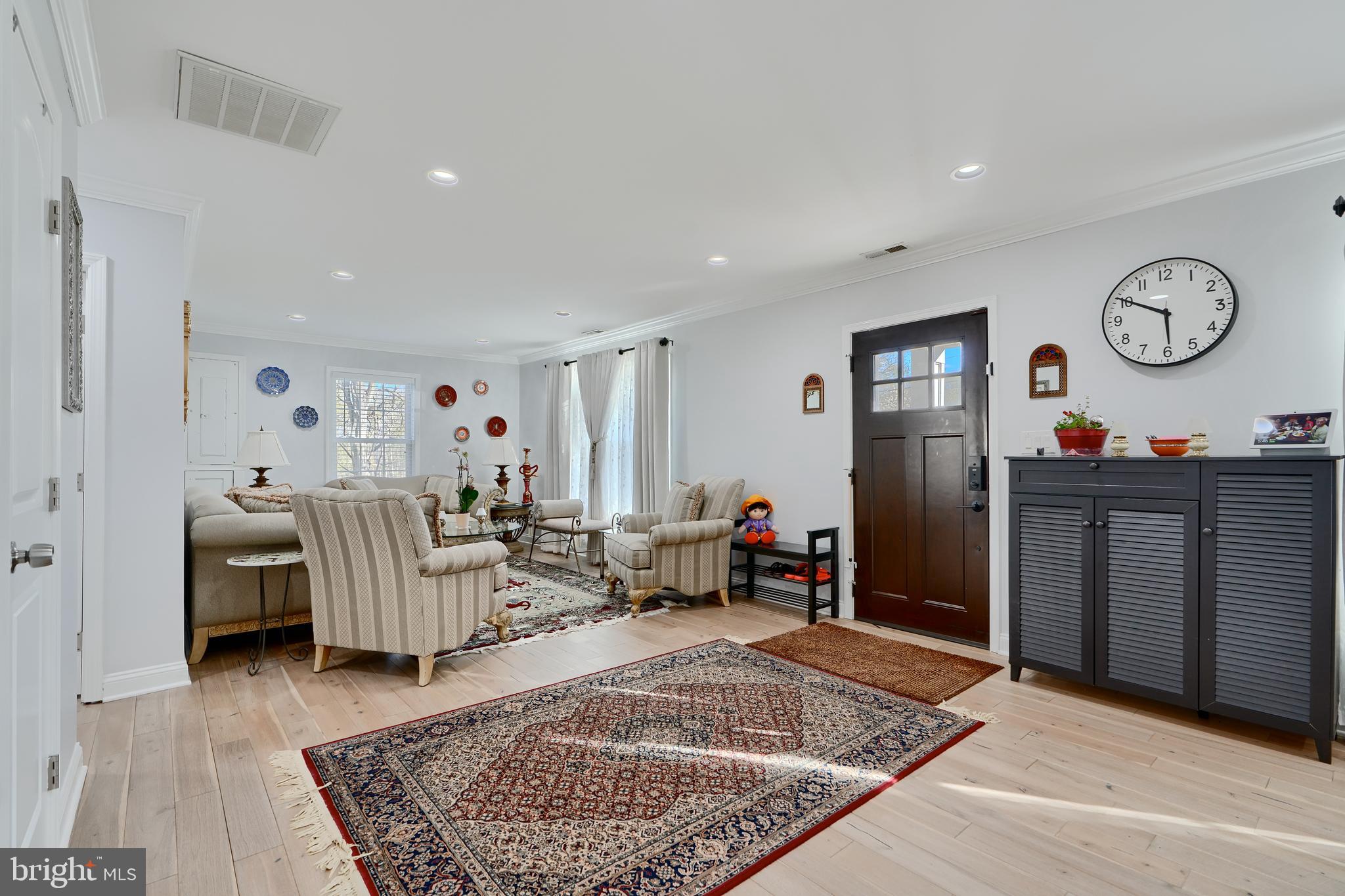 12330 Scaggsville Road Fulton, MD 20759 - Photo 4 of 40 a living room with furniture rug and a window
