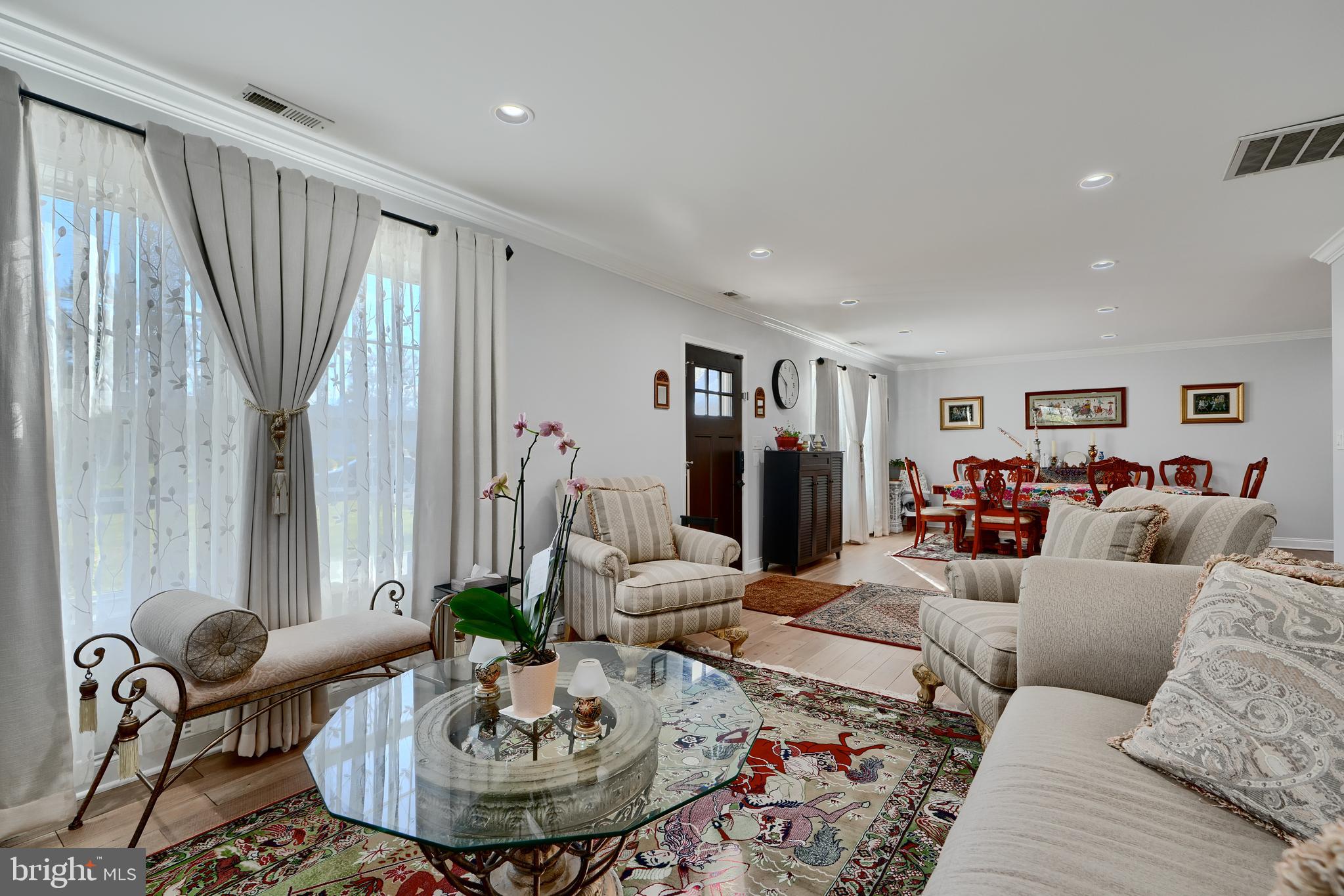 12330 Scaggsville Road Fulton, MD 20759 - Photo 5 of 40 a living room with furniture and a potted plant