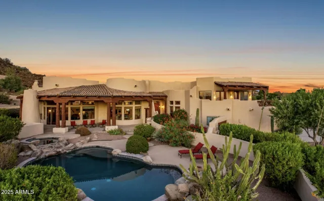 a view of multiple houses with a yard