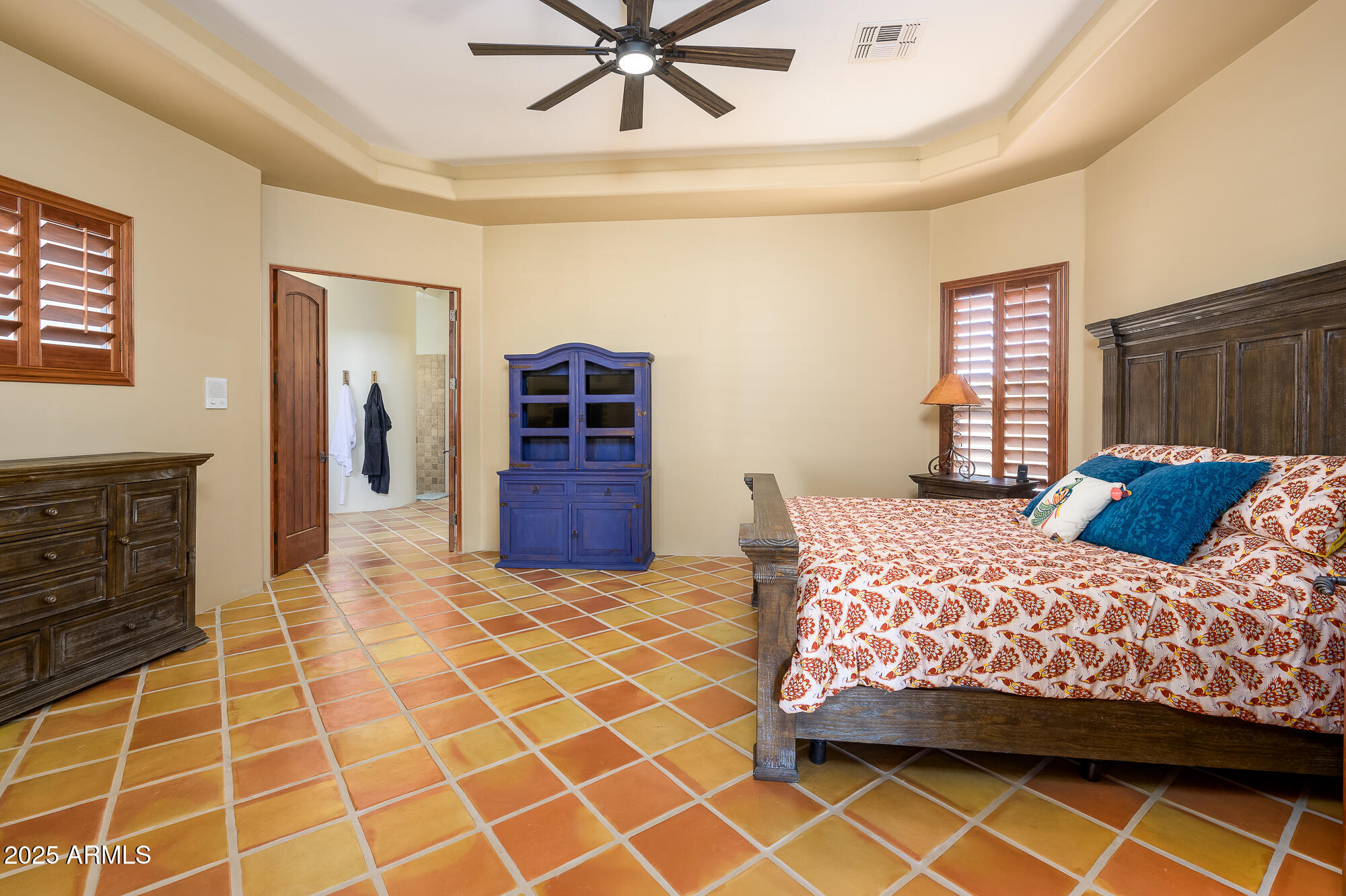 8540 East McDowell Road, Unit 29 Mesa, AZ 85207 - Photo 17 of 59 a bedroom with a bed and a window