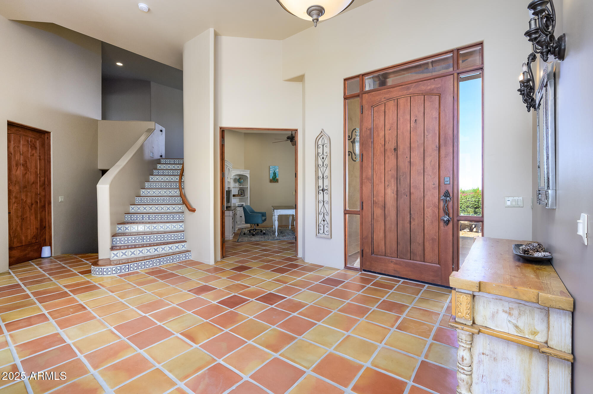8540 East McDowell Road, Unit 29 Mesa, AZ 85207 - Photo 24 of 59 a view of a bedroom with wooden floor and entryway