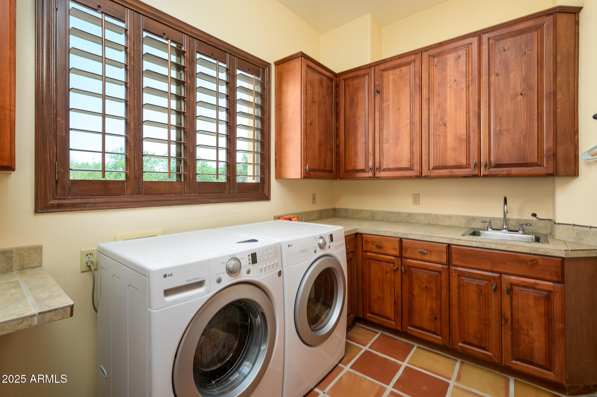 8540 East McDowell Road, Unit 29 Mesa, AZ 85207 - Photo 25 of 59 a utility room with dryer and washer