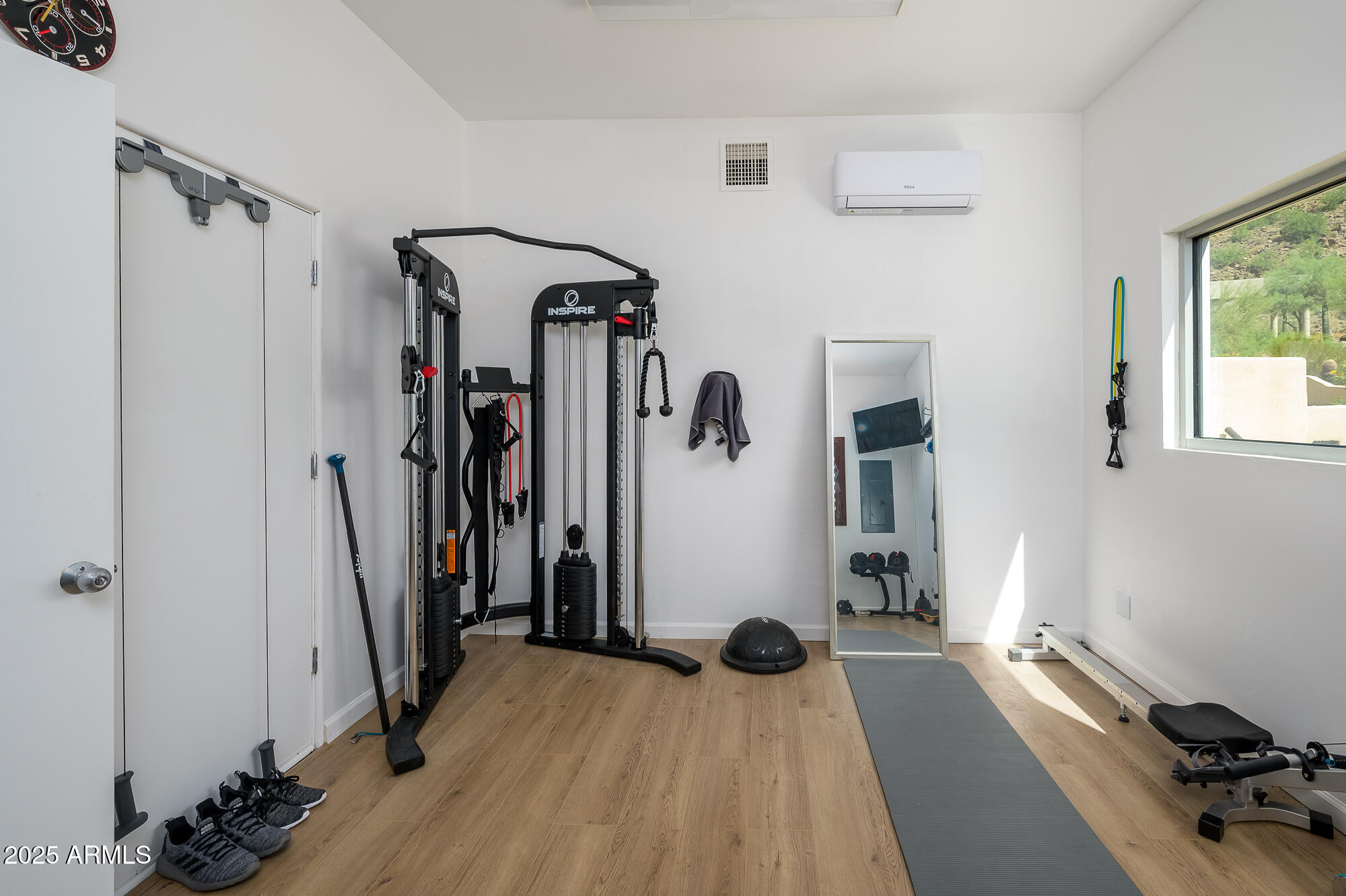 8540 East McDowell Road, Unit 29 Mesa, AZ 85207 - Photo 37 of 59 a view of a room with gym equipment and a large window
