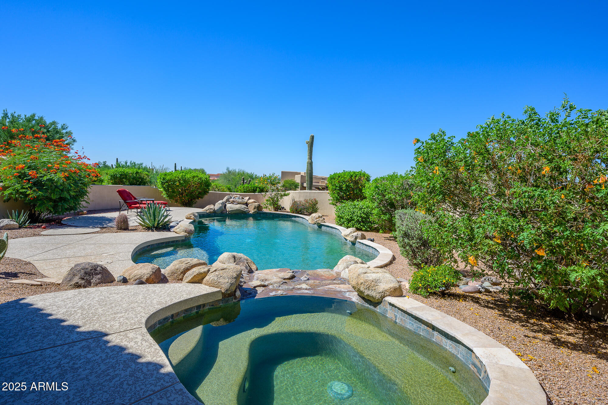 8540 East McDowell Road, Unit 29 Mesa, AZ 85207 - Photo 46 of 59 a swimming pool with outdoor seating and yard